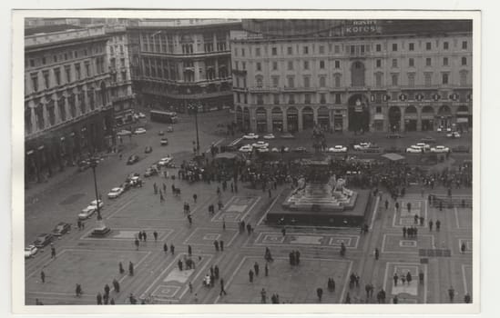 ITALY - CIRCA 1970s: Vintage photo shows the Italian town - square. Retro black and white photography. Circa 1970s.