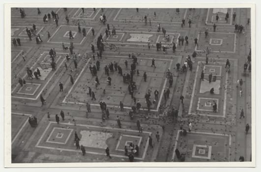 ITALY - CIRCA 1970s: Vintage photo shows the Italian town - square. Retro black and white photography. Circa 1970s.