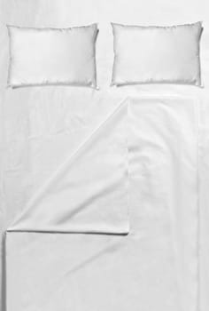 white bedding sheet and pillow sleep and dream bedroom concept