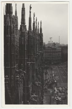 MILANO, ITALY - CIRCA 1970s: Vintage photo shows cathedral Il Duomo. Retro black and white photography. Circa 1970s.