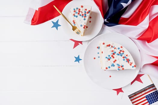 Fourth of july celebration. Sweet cake with usa flag colored sprinkles and stars , flag background top view flat lay