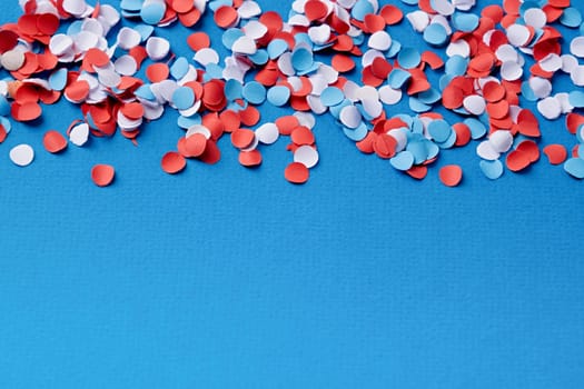 4th of July American Independence Day, colorful circle shape confetti from shredded paper , decorations for fourth july with copy space