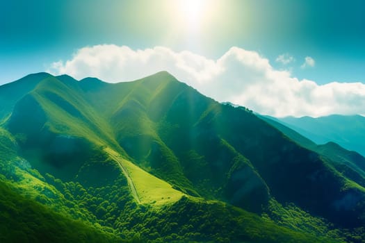 Beautiful sunrise over the green mountains in morning light with fluffy clouds on a bright blue sky. Nature freshness concept.