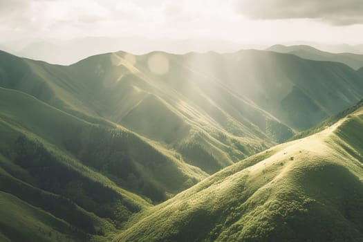 Beautiful sunrise over the green mountains in morning light with fluffy clouds on a bright blue sky. Nature freshness concept.