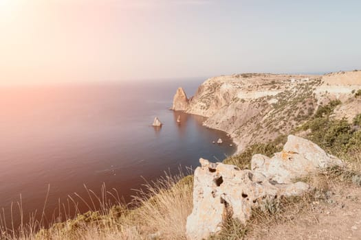 Aerial panoramic view of beautiful sunset above sea. Beautiful seascape. Sun glare, small waves on the water surface. Evening. Horizon. Nobody. No people. Copy space. Never-ending beauty of nature