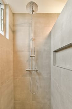a walk in shower that is very clean and ready for you to use it as a bath room or bathroom