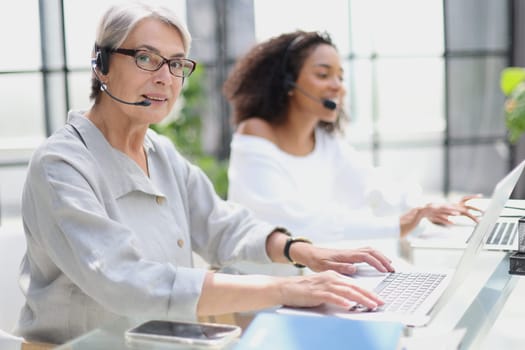 operator woman agent with headsets working in a call centre