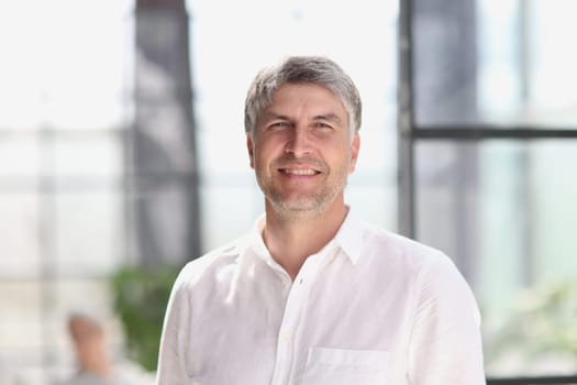 portrait of a successful business man. businessman smiling and looking at camera