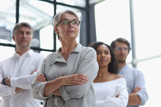 a group of pensive business people looking into the distance
