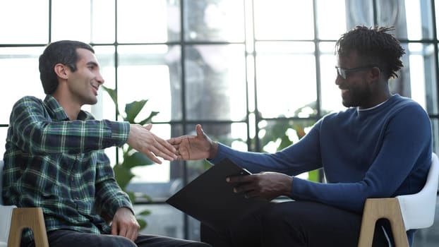 Business partners having a meeting, shaking hands