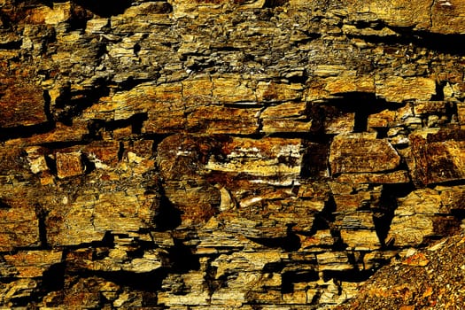 the solid mineral material forming part of the surface of the earth and other similar planets