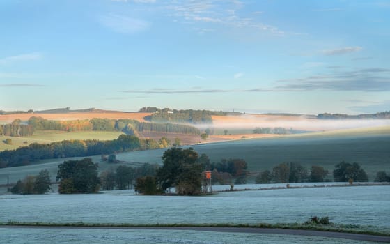 Panoramic landscape image, cold morning during autumn, Sauerland, North Rhine Westphalia, Germany