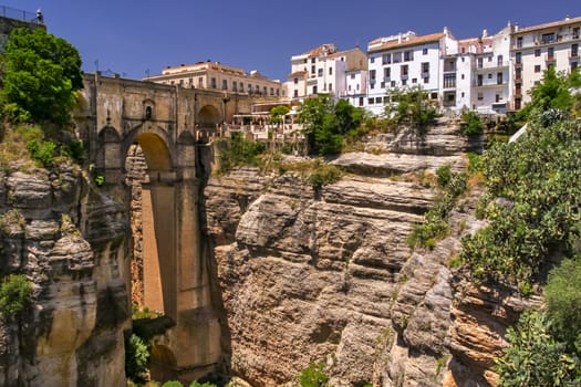 The spectacular Puente Nuevo bridge and gorge in the picturesque town of Ronda in Andalusia, Spain