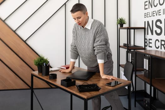 stylish woman notary at her desk in a stylish office.