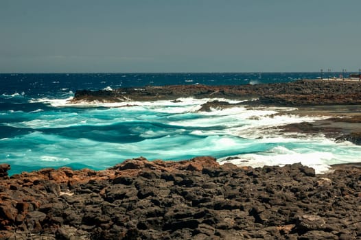 Atlantic ocean waves crashing on the rocks of Fuerteventura, Canary Islands, Spain