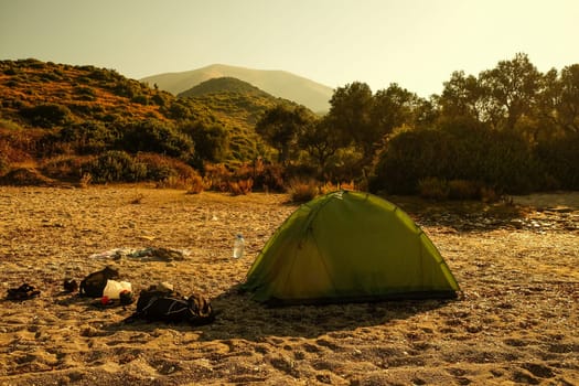 tent for camping on the beach on the background of the Seascape. High quality photo
