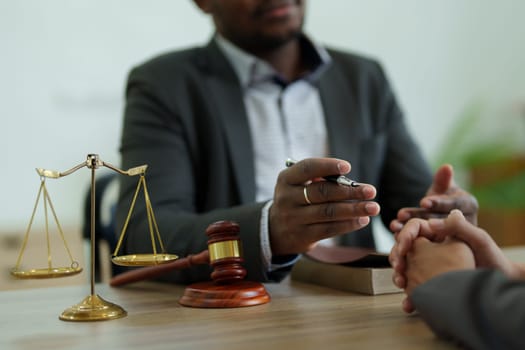 african american attorney, lawyers discussing contract or business agreement at law firm office, Business people making deal document legal, justice advice service concepts.