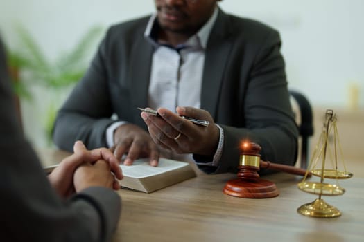 african american attorney, lawyers discussing contract or business agreement at law firm office, Business people making deal document legal, justice advice service concepts.