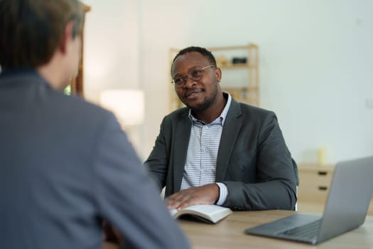 african american attorney, lawyers discussing contract or business agreement at law firm office, Business people making deal document legal, justice advice service concepts.