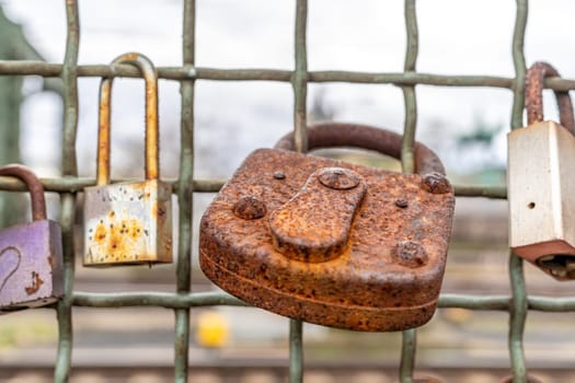 rusty metal lock on the bridge. High quality photo