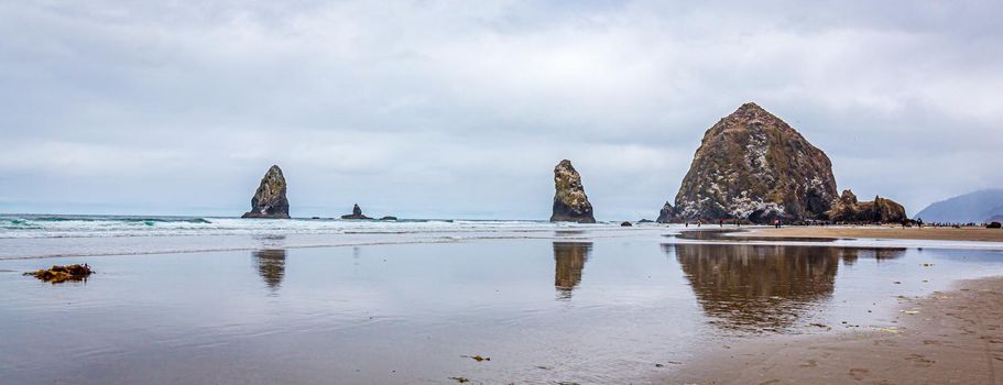 Haystack Rock and The Needles at low tide, Cannon Beach, Oregon