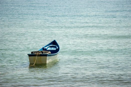 Small boats park by the sea. Small boats near the beach. Sandy beach at Sairee Beach, Chumphon Province