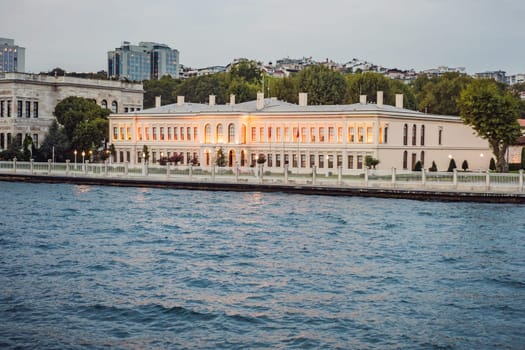 landscape scenery of Dolmabahce palacewith reflection, istanbul, turkey waterfront view from bosporus.