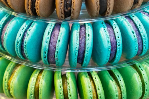 Colorful delicious French macarons pyramid for the candy bar for wedding or happy birthday party, st Valentines day, 8 march, international women day, Mother Day.