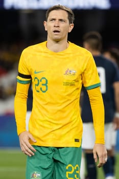 MELBOURNE, AUSTRALIA - MARCH 28: Craig Goodwin of Australia during an international friendly match between the Australia Socceroos and Ecuador at Marvel Stadium on March 28, 2023 in Melbourne, Australia.