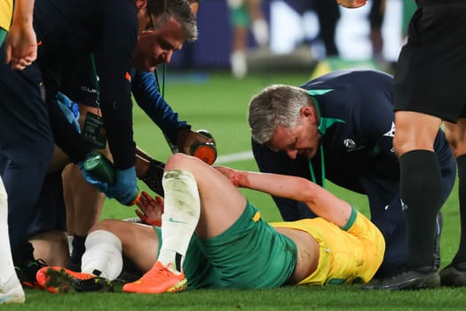 MELBOURNE, AUSTRALIA - MARCH 28: Cameron Devlin of Australia has a cut to the head during an international friendly match between the Australia Socceroos and Ecuador at Marvel Stadium on March 28, 2023 in Melbourne, Australia.