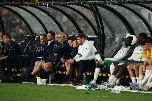 MELBOURNE, AUSTRALIA - MARCH 28: Australia bench and Mathew Ryan during an international friendly match between the Australia Socceroos and Ecuador at Marvel Stadium on March 28, 2023 in Melbourne, Australia.
