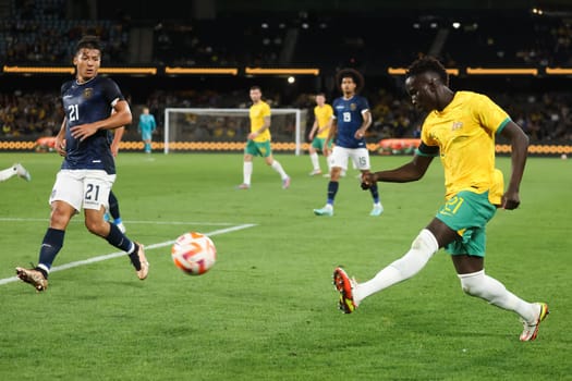 MELBOURNE, AUSTRALIA - MARCH 28: Garang Kuol of Australia during an international friendly match between the Australia Socceroos and Ecuador at Marvel Stadium on March 28, 2023 in Melbourne, Australia.