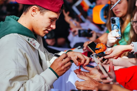 MELBOURNE, AUSTRALIA - MARCH 30: Lando Norris of Great Britain meets fans at the 2023 Australian Formula 1 Grand Prix on 30th March 2023