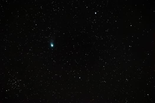 Amateur image of the green comet C/2022 E3 (ZTF) in the clear starry sky in constellation Taurus of February 12th, 2023 near Darmstadt, Germany