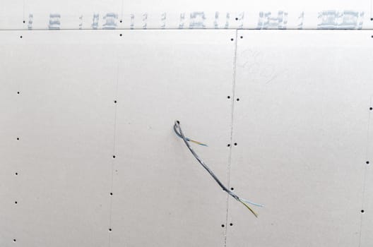 electrical wires in the wall at the construction site. High quality photo