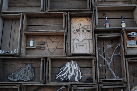 A wall of crates and old things created by young designers on Olkhon Island