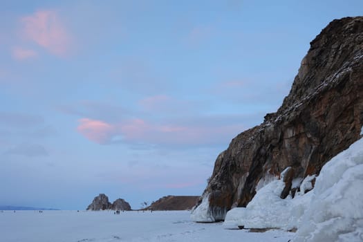 Shaman Stone on Olkhon Island on Lake Baikal in the winter evening