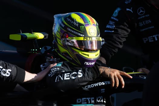 MELBOURNE, AUSTRALIA - APRIL 2: Lewis Hamilton of Great Britain of Mercedes AMG Petronas F1 Team climbs out of his car at a restart on race day during the 2023 Australian Grand Prix on April 2, 2023 in Melbourne, Australia.