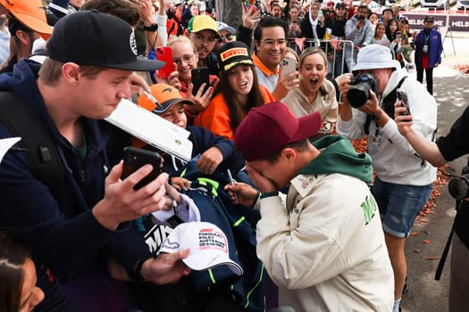 MELBOURNE, AUSTRALIA - MARCH 30: Lando Norris of Great Britain meets fans at the 2023 Australian Formula 1 Grand Prix on 30th March 2023