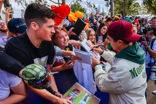 MELBOURNE, AUSTRALIA - MARCH 30: Lando Norris of Great Britain meets fans at the 2023 Australian Formula 1 Grand Prix on 30th March 2023