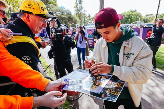 MELBOURNE, AUSTRALIA - MARCH 30: Lando Norris of Great Britain meets fans at the 2023 Australian Formula 1 Grand Prix on 30th March 2023