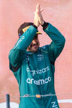 MELBOURNE, AUSTRALIA - APRIL 2: Fernando Alonso of Spain celebrates his 3rd place for Aston Martin Aramco Cognizant Formula One Team on race day during the 2023 Australian Grand Prix at Albert Park on April 2, 2023 in Melbourne, Australia.