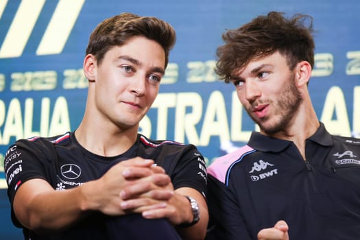 MELBOURNE, AUSTRALIA - MARCH 30: George Russell of Great Britain and Pierre Gasly of Franc during a press conference at the 2023 Australian Formula 1 Grand Prix on 30th March 2023