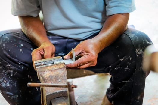 Image of Metalworker working in workshop