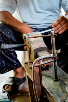 Image of Metalworker working in workshop