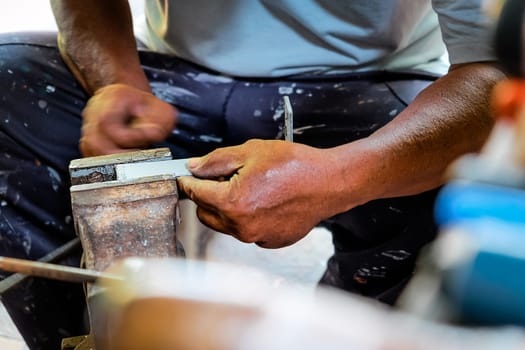 Image of Metalworker working in workshop