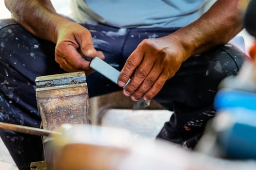 Image of Metalworker working in workshop