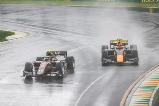 MELBOURNE, AUSTRALIA - MARCH 31: Enzo Fittipaldi of Rodin Carlin and Brad Benavides of PHM Racing in F2 at the 2023 Australian Formula 1 Grand Prix on 31st March 2023