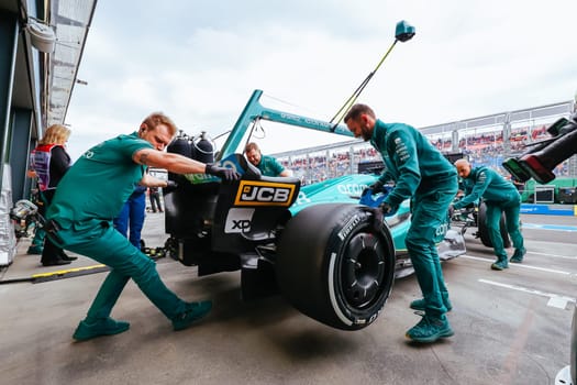 MELBOURNE, AUSTRALIA - MARCH 31: Lance Stroll of Canada drives the Aston Martin AMR23 Mercedes during practice in the 2023 Australian Grand Prix at Albert Park in Melbourne, Australia