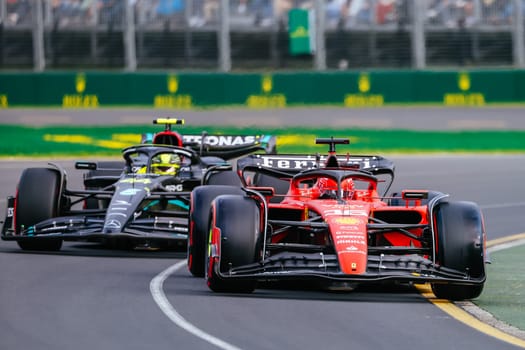 MELBOURNE, AUSTRALIA - APRIL 01: Charles Leclerc of Monaco and Lewis Hamilton of Great Britain during qualifying at the 2023 Australian Grand Prix at Albert Park in Melbourne, Australia